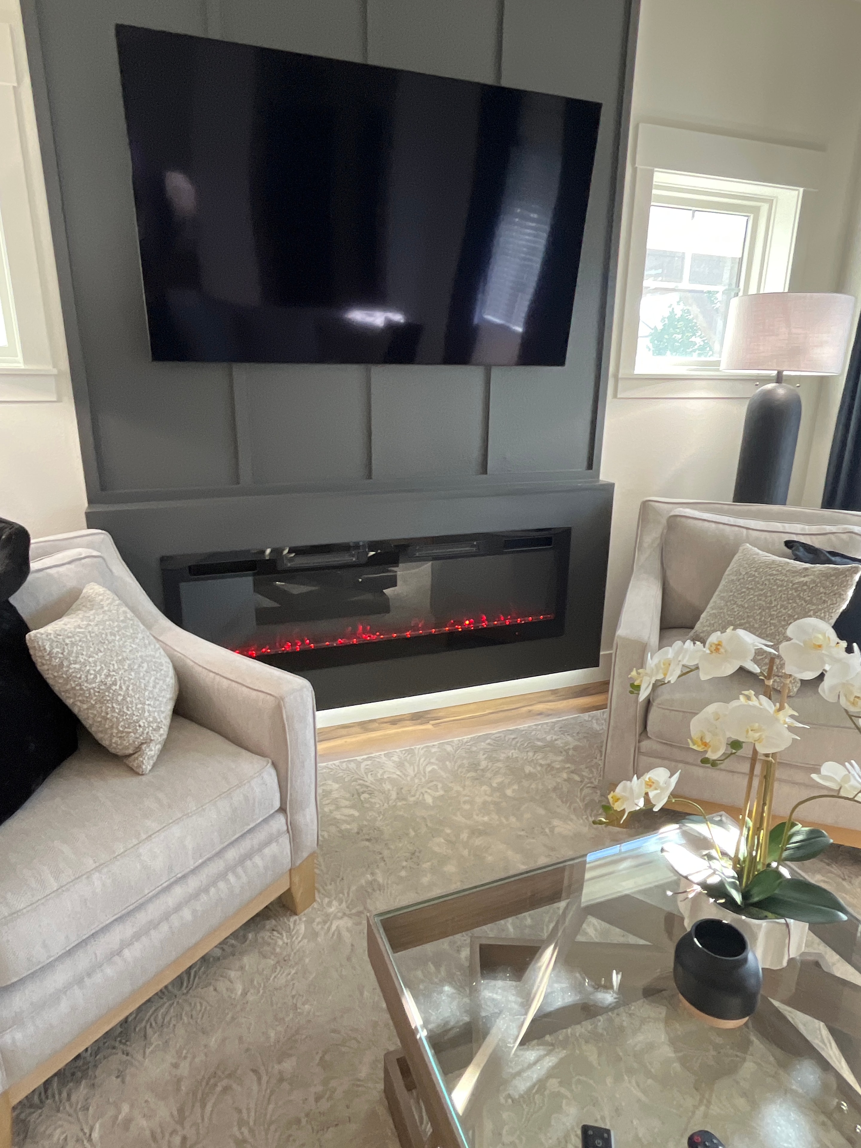 Electrical contractors reviewing a construction site